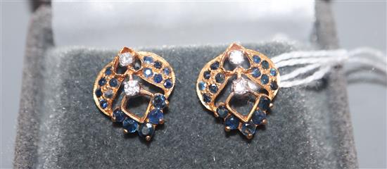 A pair of diamond and gem-set yellow metal openwork earrings (test as 18ct).